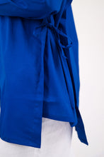 “Breath In” in blue