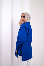 “Breath In” in blue
